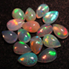 calebrated size - Ethiopian Opal - really - tope grade high quality CABOCHON - tear drops shape each pcs - have amazing - beautifull - flashy fire all around in the stone - huge size -4x6 mm approx 15 pcs -- STUNNING QUALITY - VERY VERY RARE